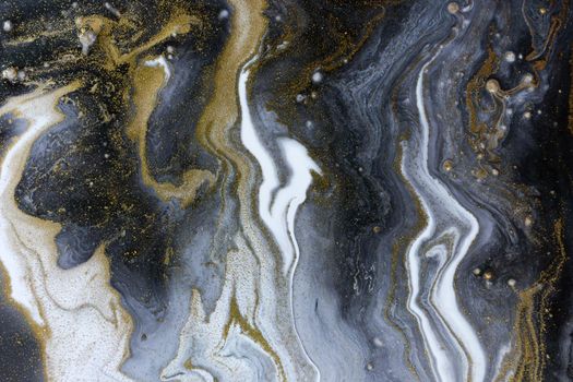 Marble gray and black abstract acrylic background with gold dust