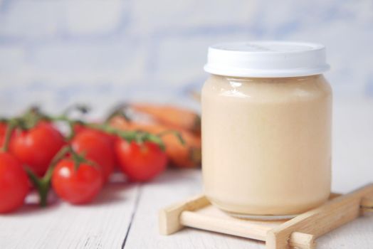 baby food in a container on table with copy space