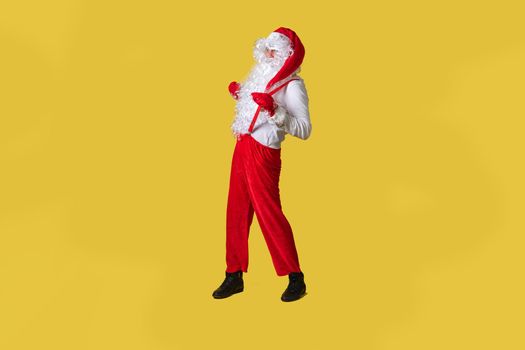 Santa claus yellow big, tradition christmas winter new, hat red caucasian, time in suspenders with a large beard