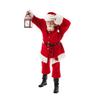 Santa Claus with lantern isolated over white background