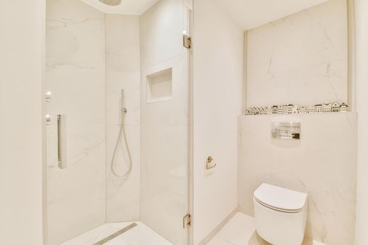 Luxurious bathroom with built-in shower head in the shower