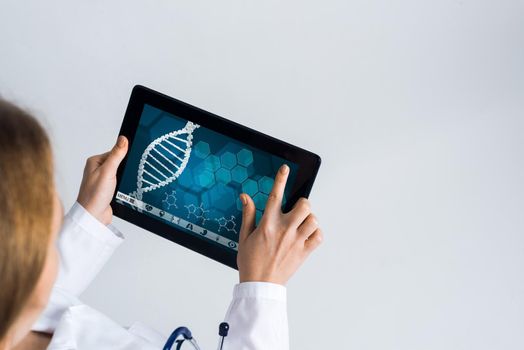 Tablet pc device with medicine interface screen in hands of doctor