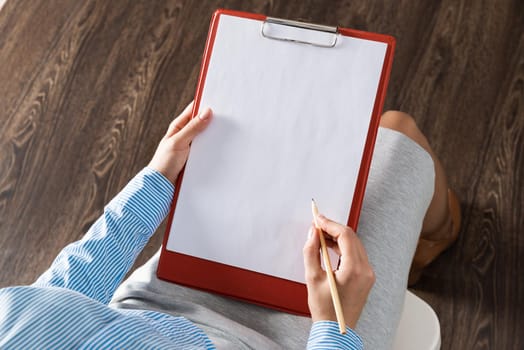 close-up a female hands with tablet and pencil