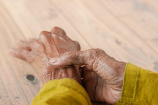 Elderly woman suffering from pain