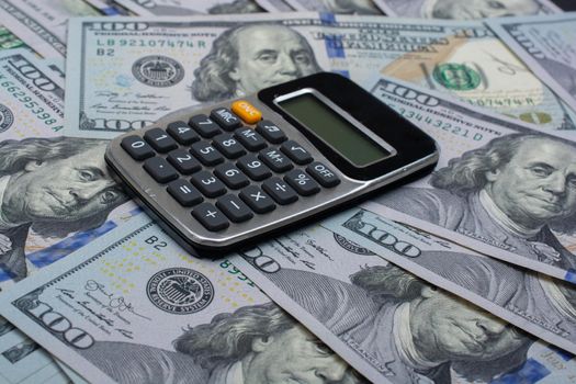 Calculator on  American dollars. Financial conception. Finance and Savings