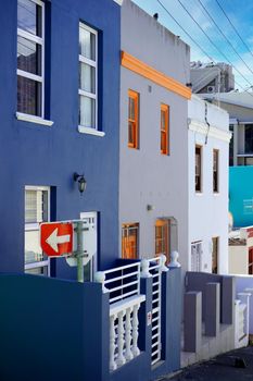  Bo-Kaap district, Cape Town, South Africa - 14 December 2021 : Distinctive bright houses in the bo-kaap district of Cape Town, South Africa