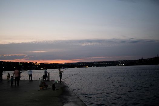 People fishing on the Golden Horn coast on display