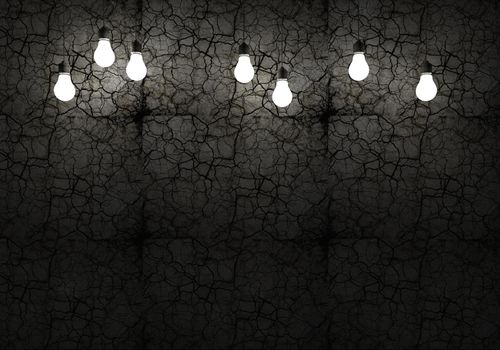 Cracked Wall and Bulbs. Dark and Grunge Wall Background with Light Bulbs.
