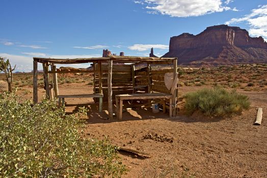 Arizona Navajo Nation Indian Reservation Landscape with Damaged Small Indian Jewelry Selling Booth. 