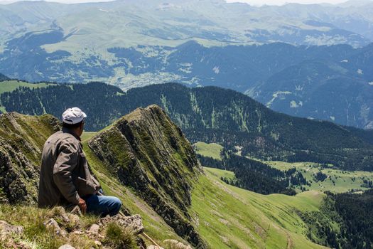 hikers with backpacks and trekking poles walking in Turkish highland