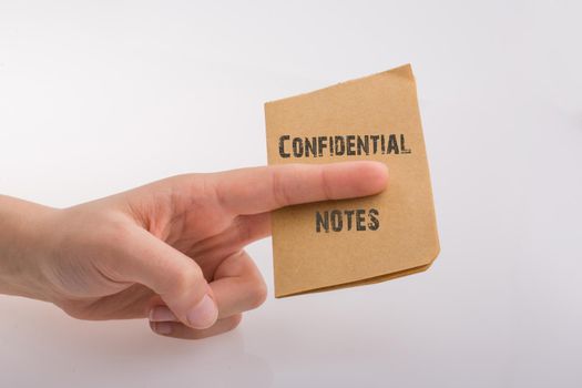 Brown paper  text confidental on a white background