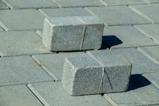 Concrete pavement tile stones as building material