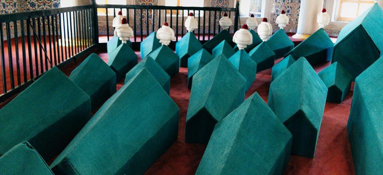 Rows of coffins in an ottoman turkish mausoleum tomb