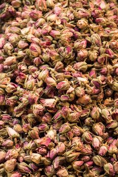 Background of dried rose buds as herbal tea