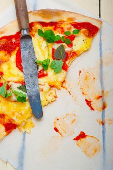 Italian traditional pizza Margherita tomato mozzarella and basil