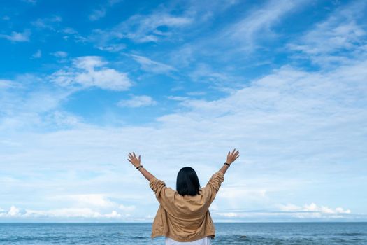 Woman travel around the world with summer beach freedom and relax life concept.