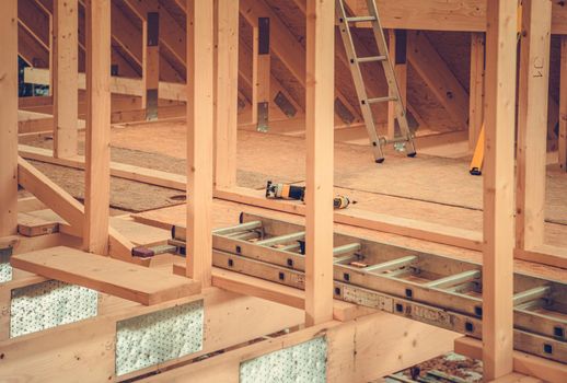 Part of Wooden House Skeleton Frame in the Construction Site. Building Wood Homes. Industrial Theme.