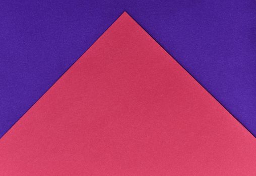 abstract geometric paper background. violet and red trendy colors. The backdrop for an invitation card, greeting card or web design. Creative copy space, flat lay.