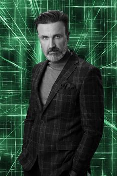 Black and white portrait of a stylish elegant senior businessman with a beard and casual business clothes against retro colorful pattern design background gesturing with hands. High quality photo