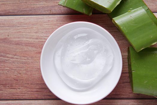 Close-up Fresh Aloe vera sliced and liquid gel on white background ,