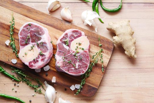 close up of raw meat on chopping board on a chopping board .