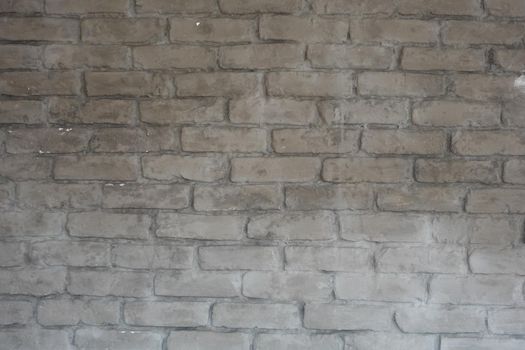 detail show of old gray brick wall ,