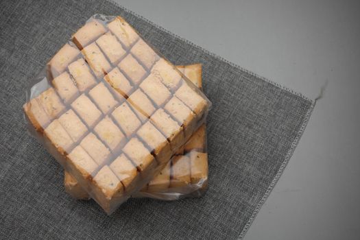 close up of sweet cookies on wooden table .