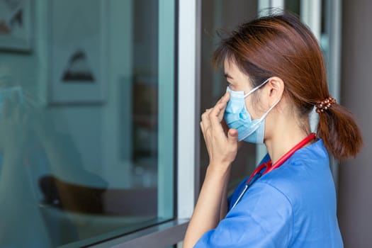 Nurse Doctor medical staff check tightness fit air leak seal of wearing the mask for safety Covid protection