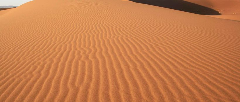 Scenic ridges of sand dunes in Sahara Desert,Morocco