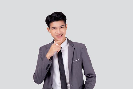 Portrait young asian business man in suit with smart thinking idea isolated on white background, businessman standing and planning for success, handsome manager or executive, emotion and expression.