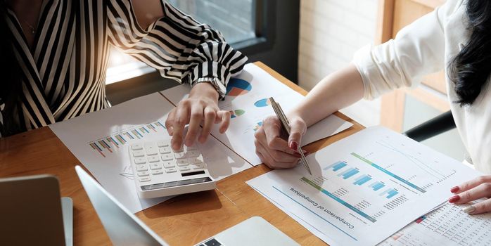 financial advisory services. Group of business advisor showing plan of investment to clients in the consultancy office.