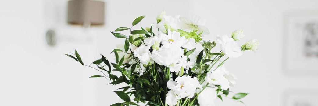 Bouquet of flowers in vase and home decor details, luxury interior design closeup