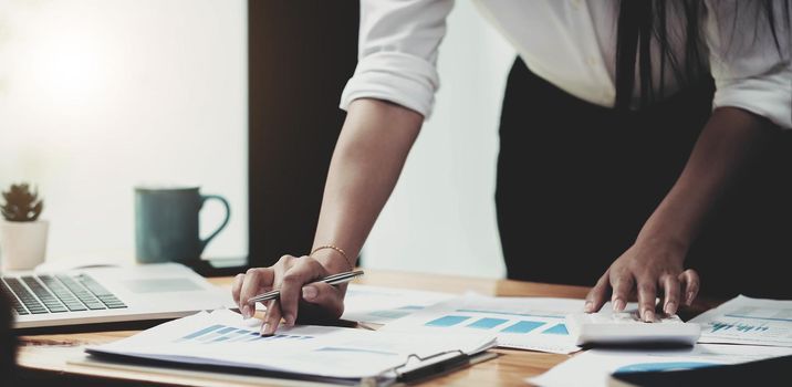 accountant woman working on desk business finance and accounting.