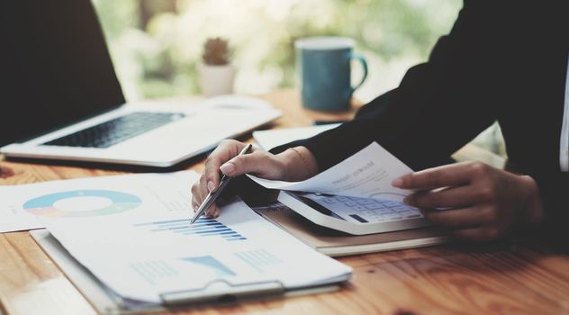 accountant woman working on desk business finance and accounting.