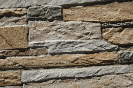 old stone wall and brick pattern background in sunny day