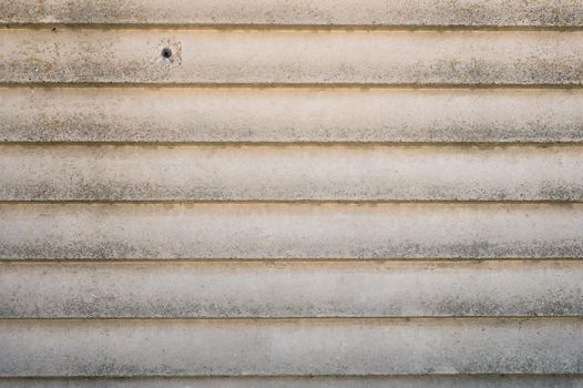 concrete slab with horizontal line pattern. photo background loft style.