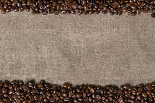 Coffee beans on burlap background. Top view. Copy space. Still life. Mock-up. Flat lay