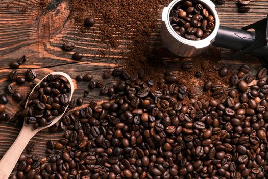 Coffee beans on wooden table texture with copy space. View from above. Still life. Flat lay. Mock-up