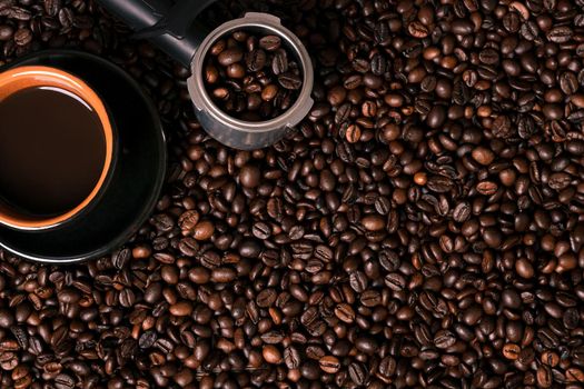 Coffee cup on coffee beans background. Top view. Still life. Copy space. Flat lay.