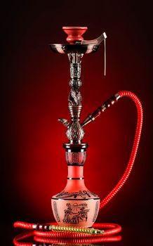 Red Colorful smoking hookah, studio shot on