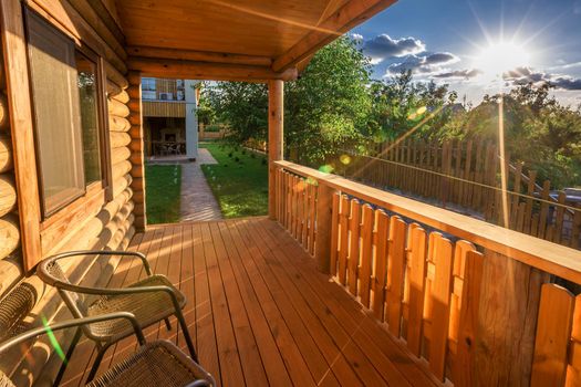 Interior design: Beautiful modern terrace lounge with pergola at sunset