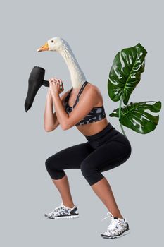 Beauty atletic woman in sport clothes with goose head. Sports concept on the theme of comics and сontemporary art collage.