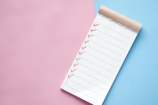 check mark on a check box on a paper .