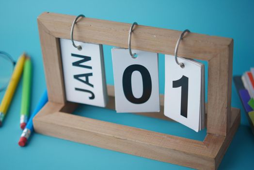 wooden calendar set on 1st of january ,
