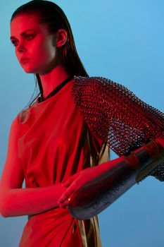 beautiful woman red light silver armor chain mail fashion Lifestyle unaltered. High quality photo