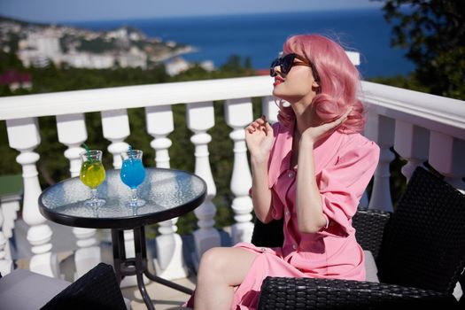 attractive woman pink hair sunglasses leisure luxury vintage Summer day. High quality photo