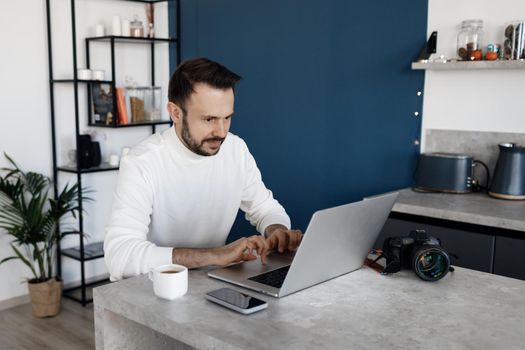 Handsome man indoor at home. High quality photo