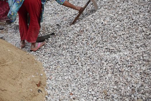 women labor working in a construction site in dhaka in bangladesh,
