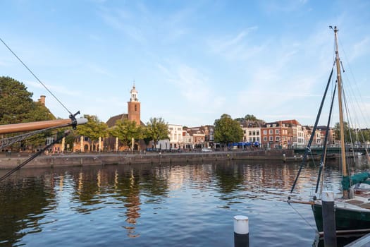 Hellevoetlsuis,Holland,02-08-2021:city view with harbour and church Vestingkerk in Hellevoetsluis at dusk, South Holland, Netherlands