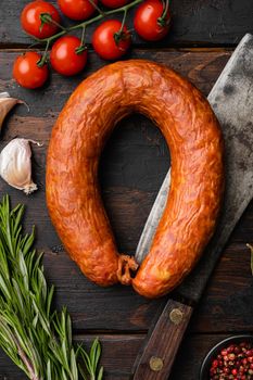 Spanish smoked sausage set, on old dark wooden table background, top view flat lay